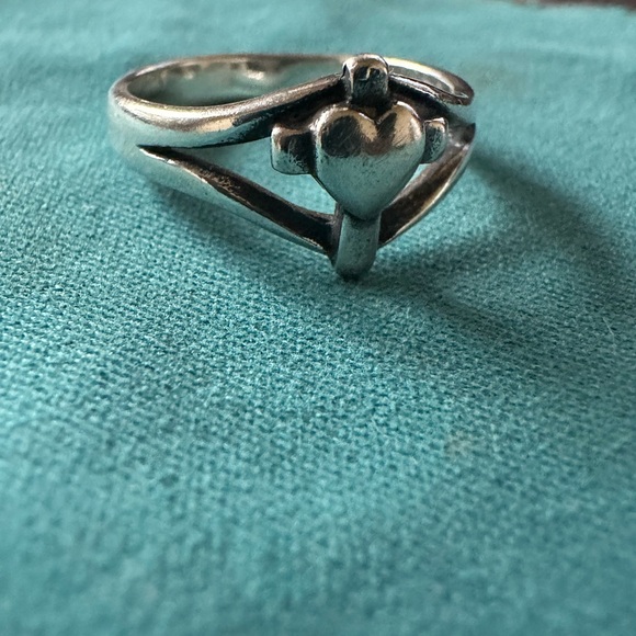 James Avery sterling silver retired cross with heart ring
Size 5 1/2 - Picture 5 of 5